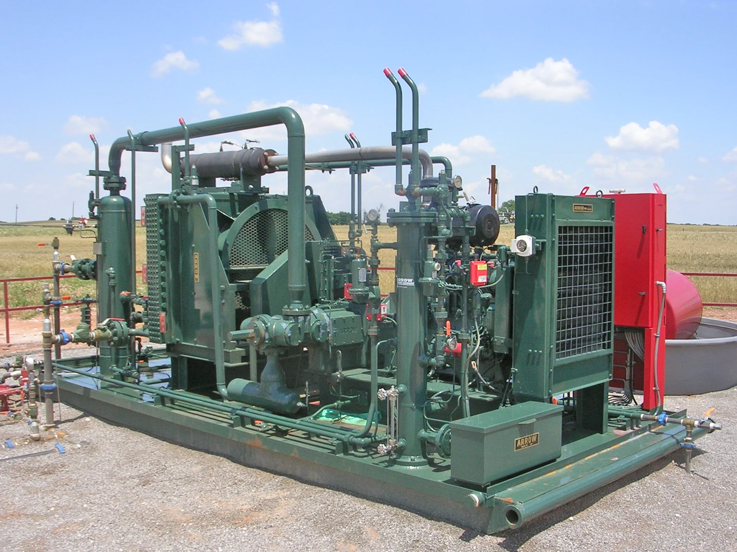 Skid-mounted wellhead compressor unit in the field